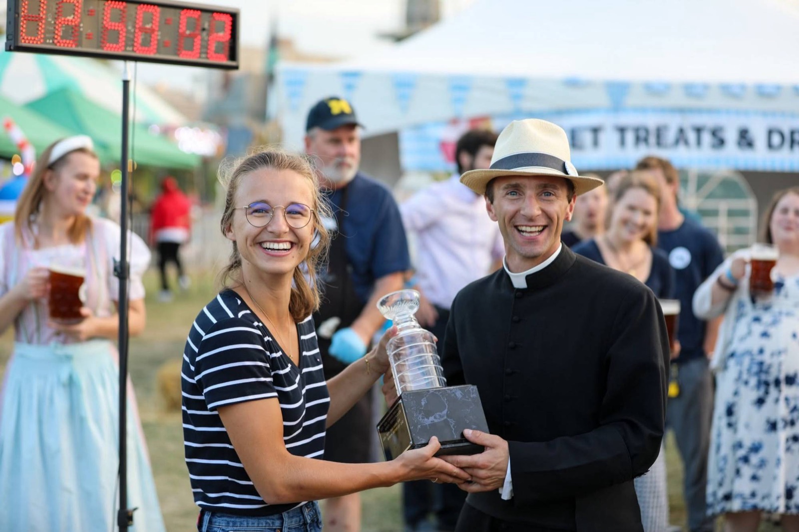 Claire Commins accepting the Steinly Cup from the Canon